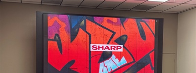 Sharp Product Dealer Revamps Meeting Room with Products Close to Home