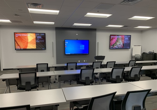Promoting Multi-Point Collaboration in a Training Education Room