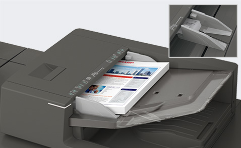 Documents in the top feeder tray and insert showing the envelope guide