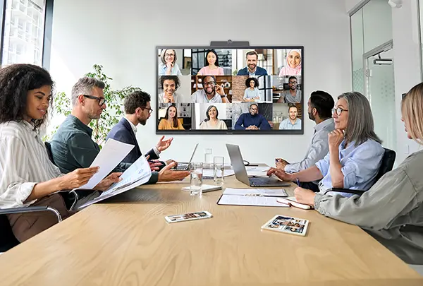 conference room with 6 people having an online meeting