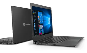 Image of two open Dynabook laptops on a table facing back to back