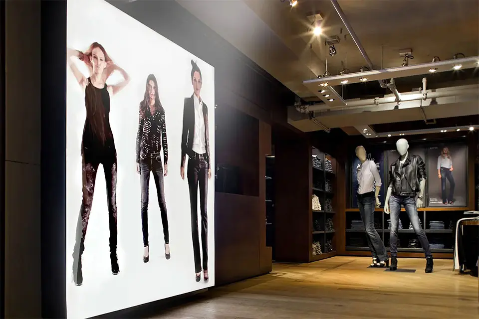 Laser projector in retail environment