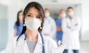 Group of doctors with face masks on