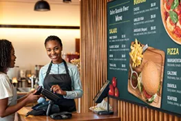 Display showing Teams call with four people on split screen 